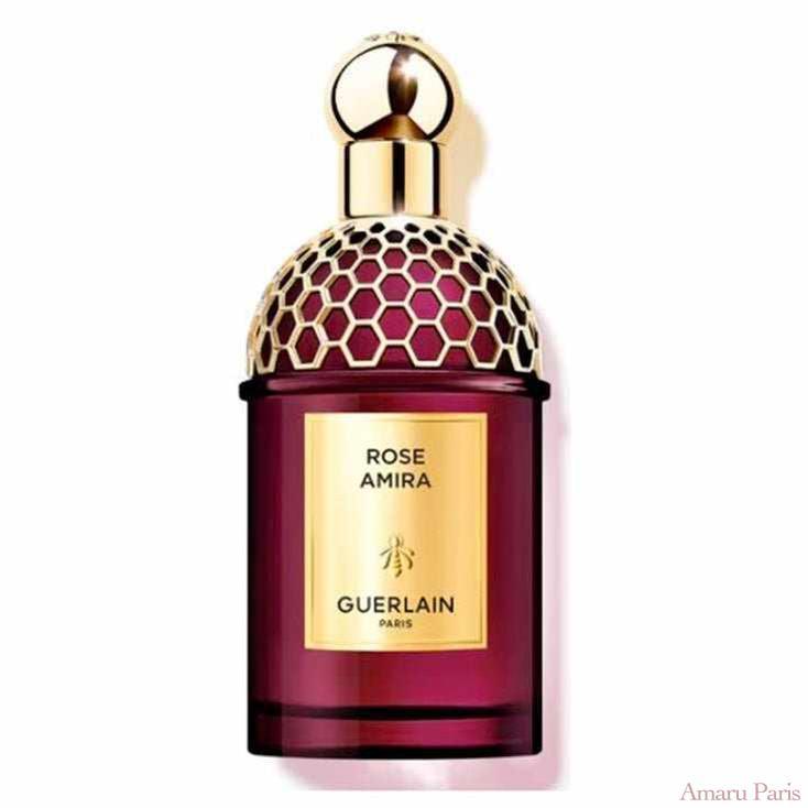 Guerlain Rose Amira unisex fragrance bottle with gold honeycomb cap and red glass body